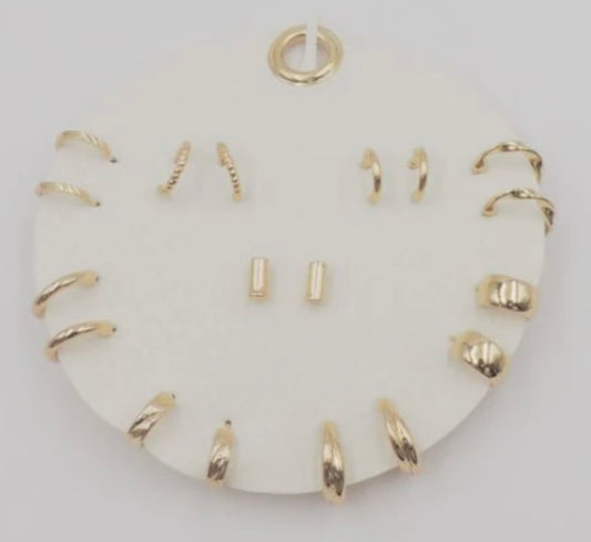 Set of 9 Geometric Stud and Hoop Sets on a Leather Circle Display, Best Seller!
